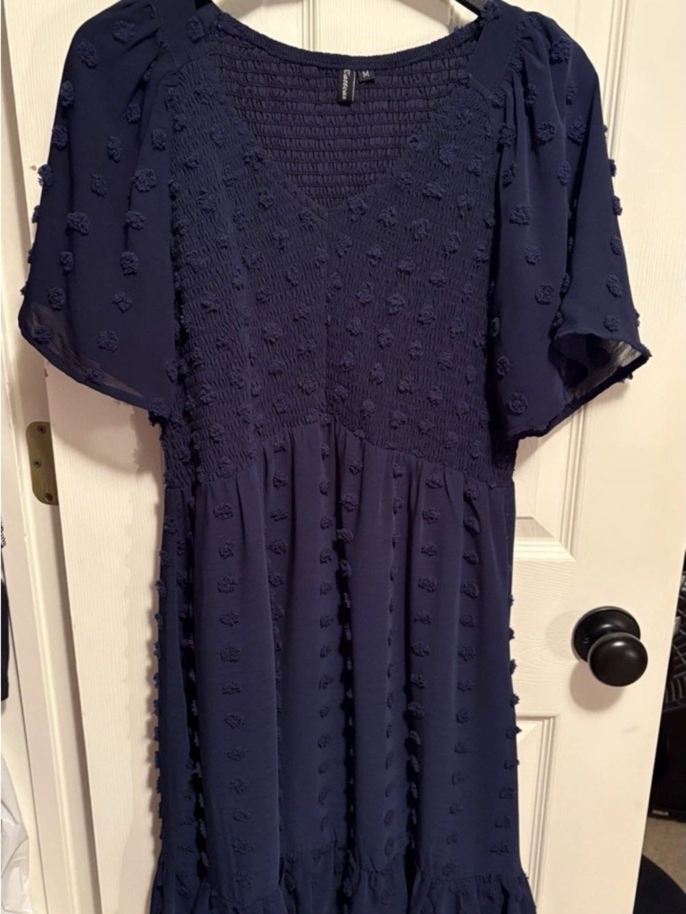 Smocked Navy knee length Dress with Textured Dot Detail
